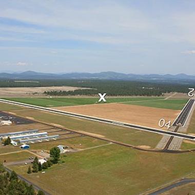 Deer Park Airport runway located on flat grasslands. 