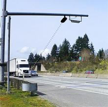 Photo of truck approaching camera, demonstrating how the automated license plate reader works. 